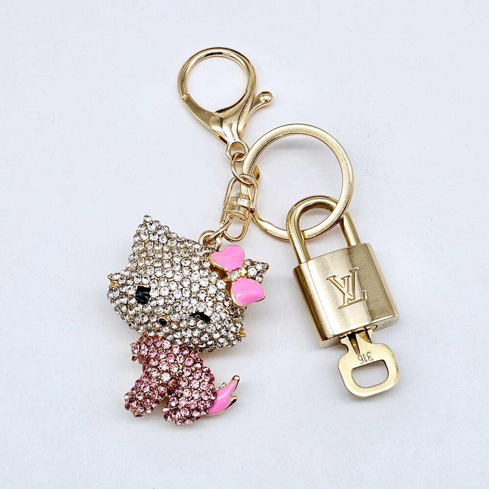 Louis Vuitton Gold Lock 🔒 Authentic LV Key + Unbranded Hello Kitty Bag Charm